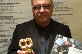 Stefan-Kitanov-with-Award.jpg